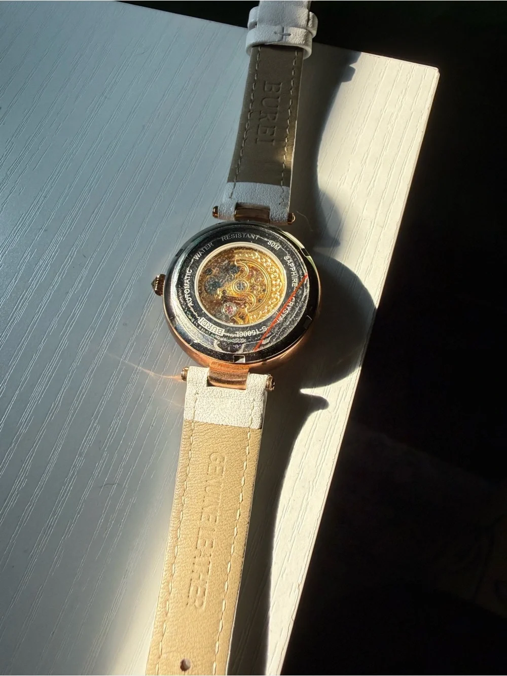 Bureau Rose Gold Skeleton Dial Watch with White leather Strap